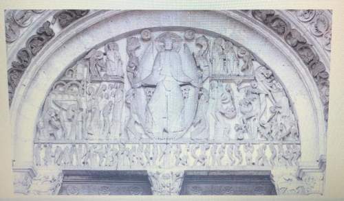 Is the west portal of saint-lazare an example of sunken relief, or in-the-round sculpture?