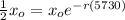 \frac{1}{2} x_o = x_o e^{-r(5730)}