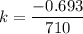 k = \dfrac{-0.693}{710}