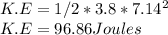 K.E =  1/2 * 3.8 *7.14^{2}\\ K.E = 96.86Joules