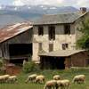 Where would you most likely see the types of homes shown in this picture?  a. rural spain.