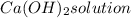 Ca(OH)_2  solution