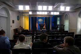 Describe two things you see in the Briefing Room that a president does as part

of their job. Explai