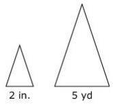 The figure on the left represents a scale drawing of the figure on the right. What is the scale?