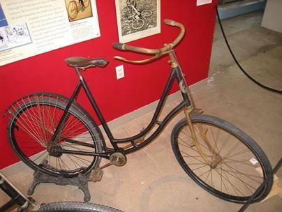 Look at the photograph and read the caption. A Columbia Model 51 Ladies' Chainless bicycle. Caption: