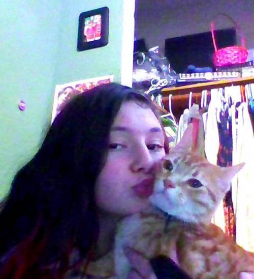 How cute is my cat and me?????????