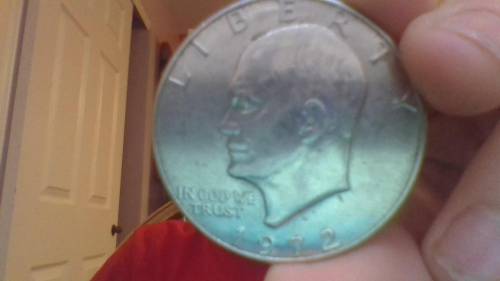 What kind of coin is this? i found it on the sidewalk: