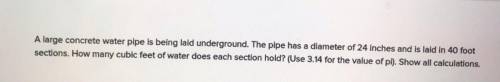 A large concrete water pipe is being laid underground. The pipe has a diameter of 24 inches and is