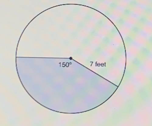 A sprinkler is set to water the section of lawn represented by the shaded region in the circle belo