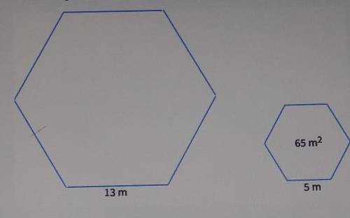 These hexegons are similar. find the area of the larger trapezoid to the nearest whole number.

An