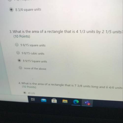 What is the area of a Rectangle that 7 3/8 units long and 6 4/6 units wide?