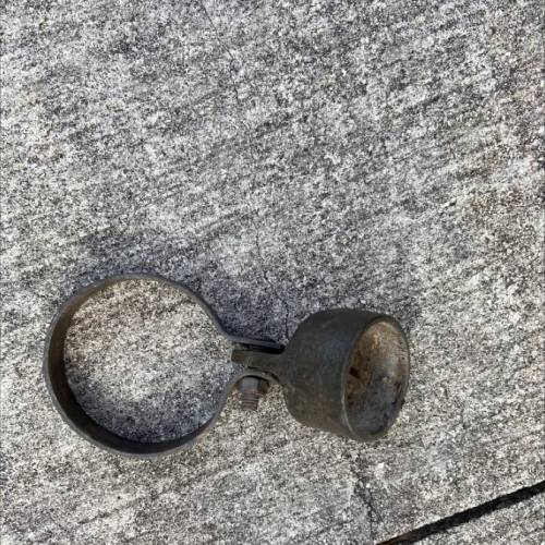 What is this metal ring with a bell looking thing on the end?