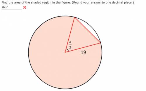 Please help me with this Question

Thanks 
Find the area of the shaded region in the figure. (Roun