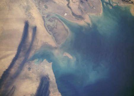 Below is an image of the burning oil wells of Kuwait and the Persian Gulf. Provide the evidence and